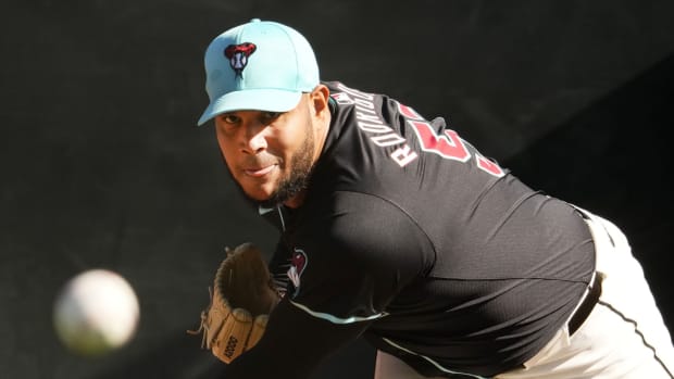 Arizona Diamondbacks left-hander Eduardo Rodriguez (57) throws a bullpen session at Salt River Fields.